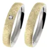 Alianzas de boda de acero y oro amarillo con diamante