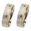 Alianzas de boda de acero y oro amarillo con diamante