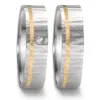 Alianzas de boda de acero y oro amarillo con diamante