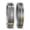 Alianzas de boda de titanio y oro amarillo con diamantes