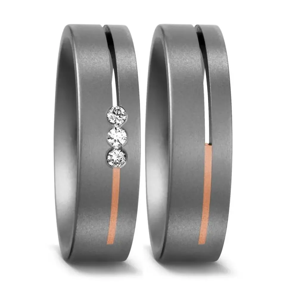 Alianzas de boda de titanio y oro rosado con diamantes
