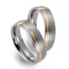 Alianzas de boda de titanio y oro amarillo con diamante