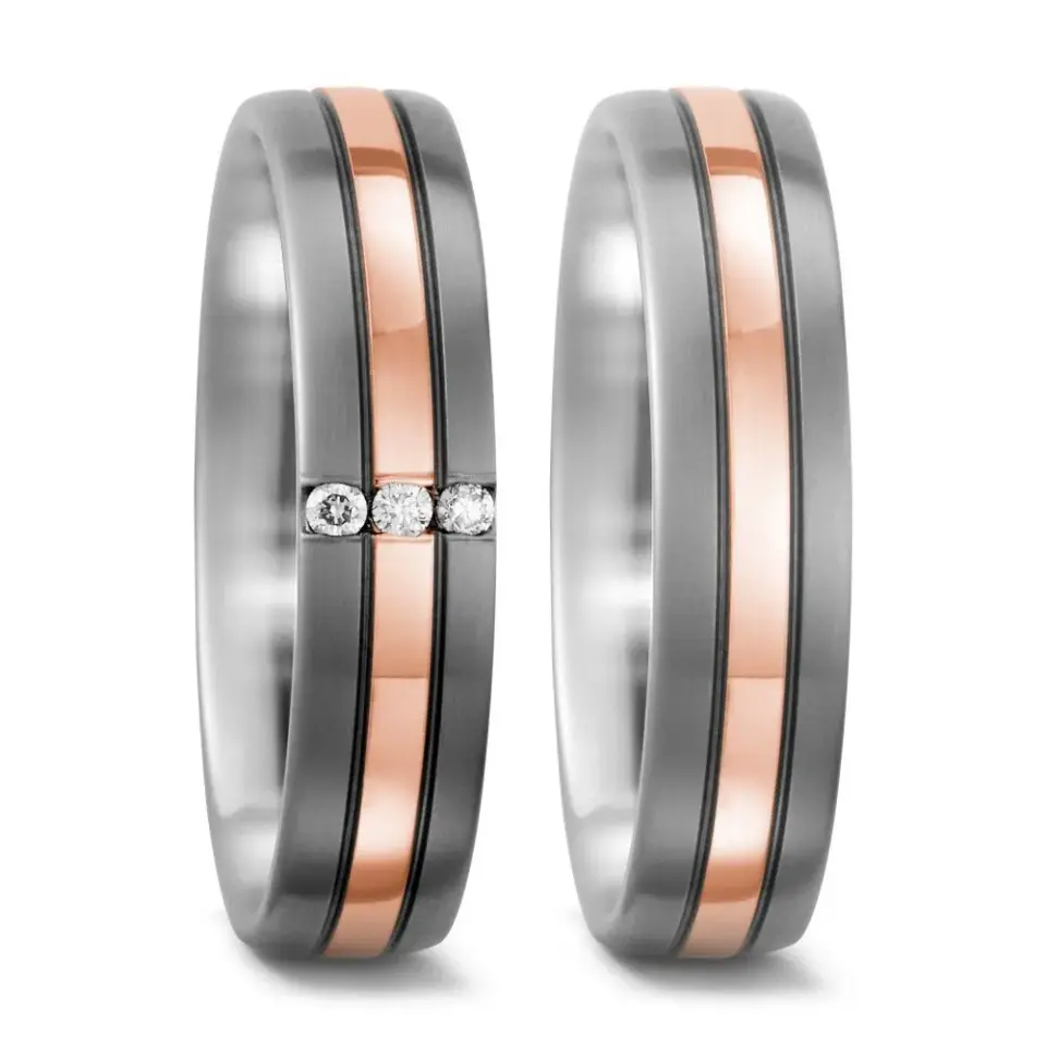 Alianzas de boda de titanio y oro rosado con diamantes