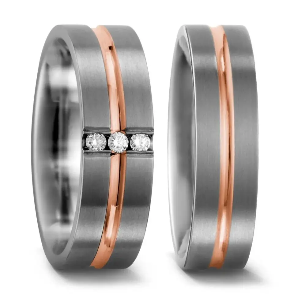 Alianzas de boda de titanio y oro rosado con diamantes