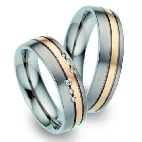 Alianzas de boda de titanio y oro amarillo con diamantes