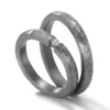 Alianzas de boda de tántalo con diamante