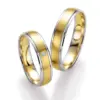 Alianzas de boda de paladio y oro amarillo con diamante