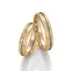 Alianzas de boda de oro amarillo y paladio con diamantes