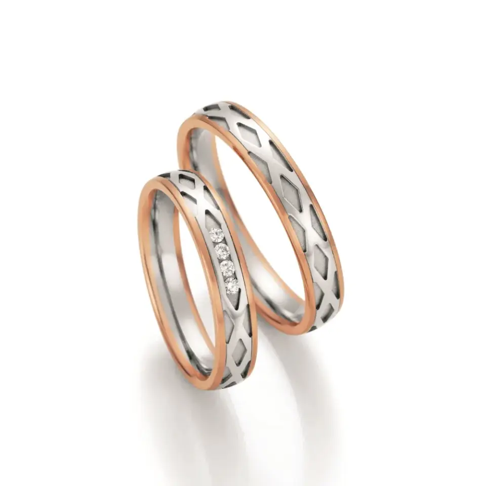 Alianzas de boda de oro rosado y paladio con diamantes