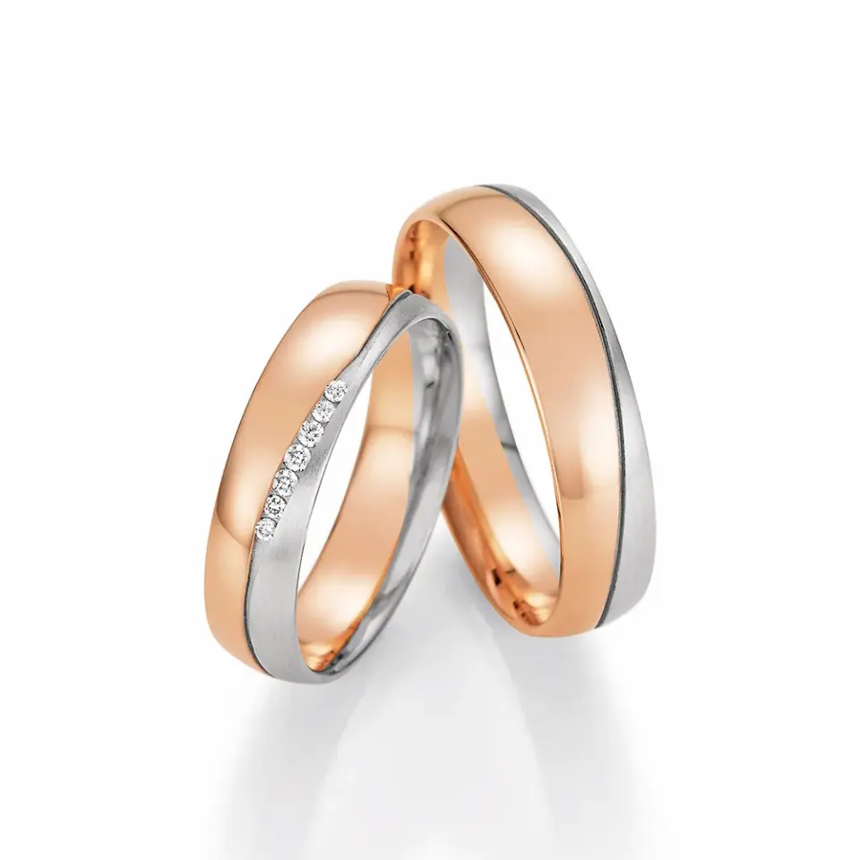 Alianzas de boda de oro rosado y paladio con diamantes