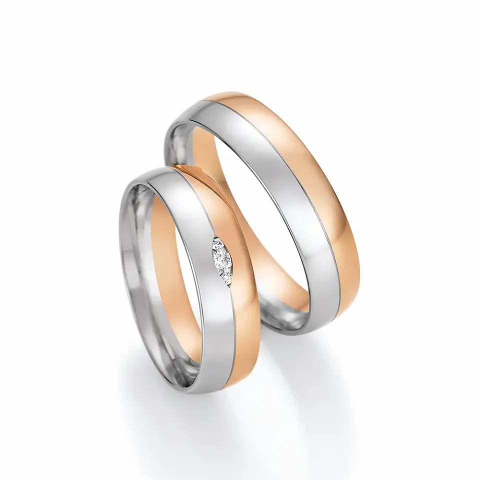 Alianzas de boda de platino y oro rosado con diamantes