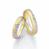Alianzas de boda de paladio y oro amarillo con diamante