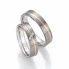 Alianzas de boda de titanio y oro rosado con diamantes