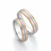 Alianzas de boda de acero y oro rosado con diamantes