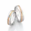 Alianzas de boda de acero y oro rosado con diamante