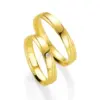 Alianzas de boda de oro amarillo con diamante