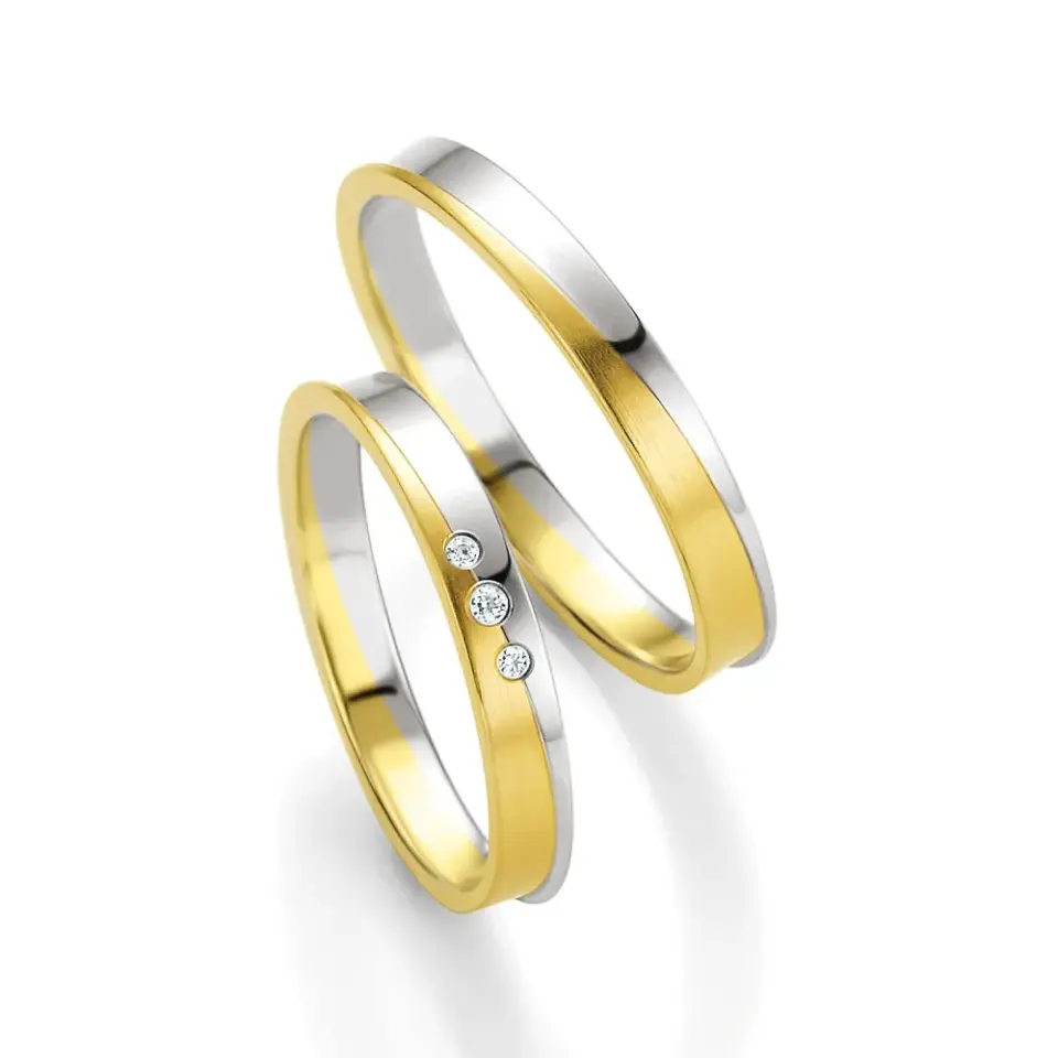 Alianzas de boda de oro amarillo y paladio con diamantes