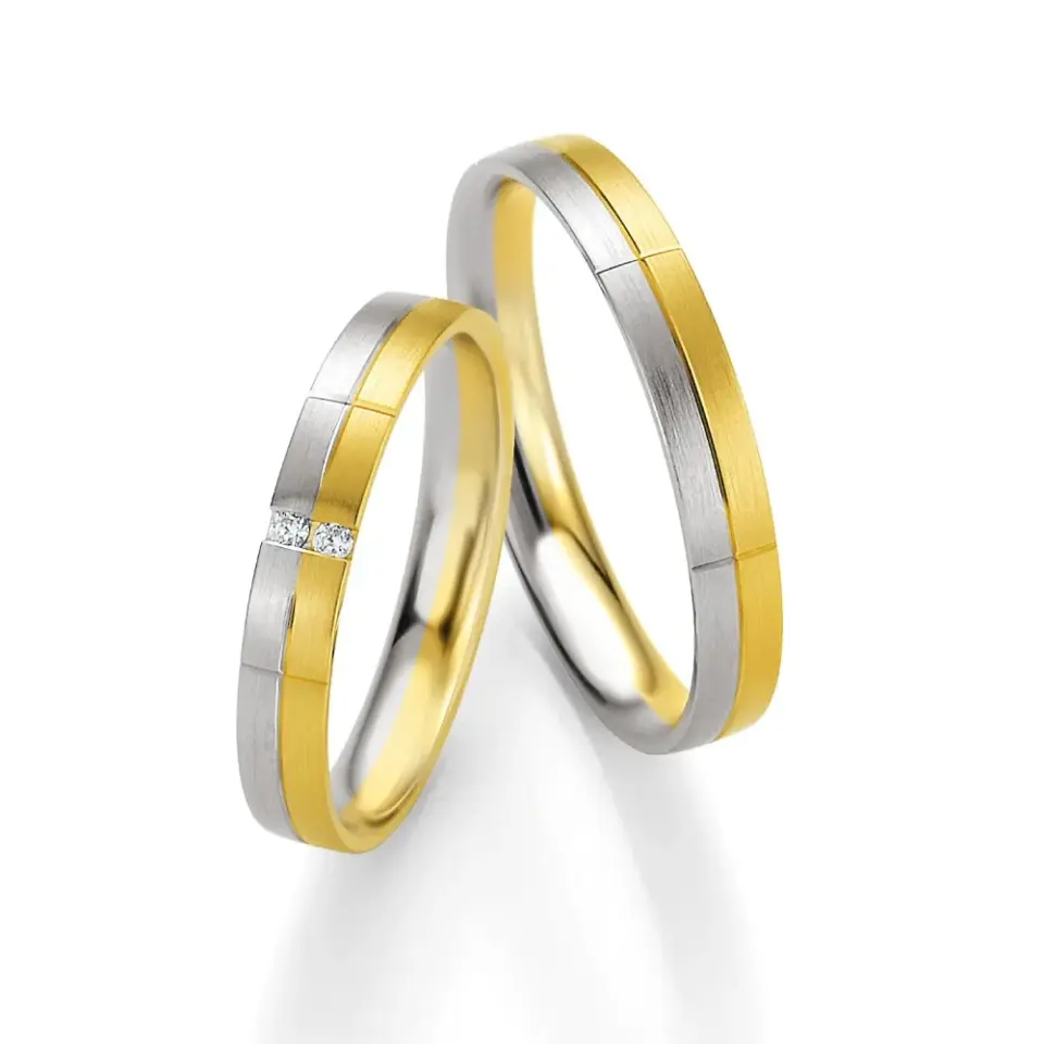 Alianzas de boda de oro amarillo y paladio con diamantes