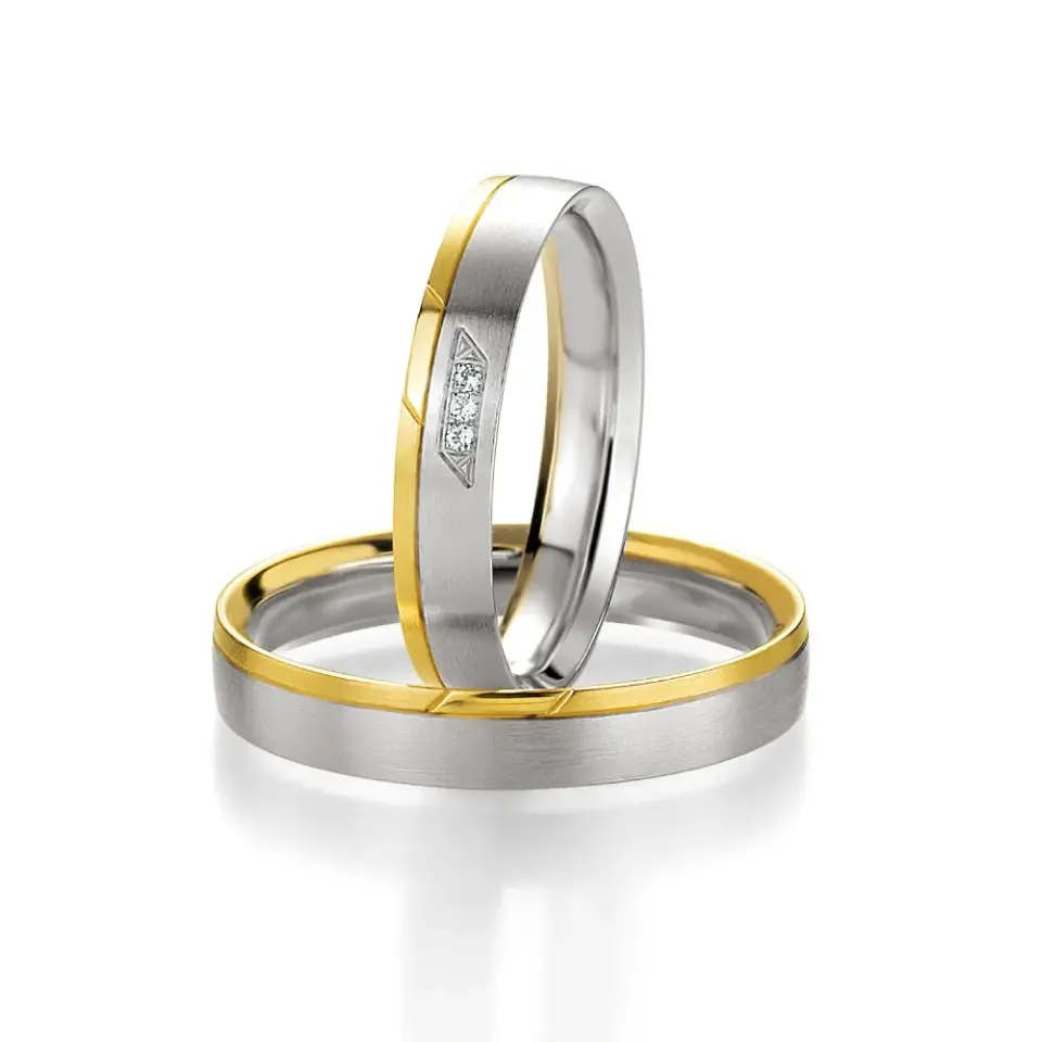 Alianzas de boda de oro amarillo y paladio con diamantes