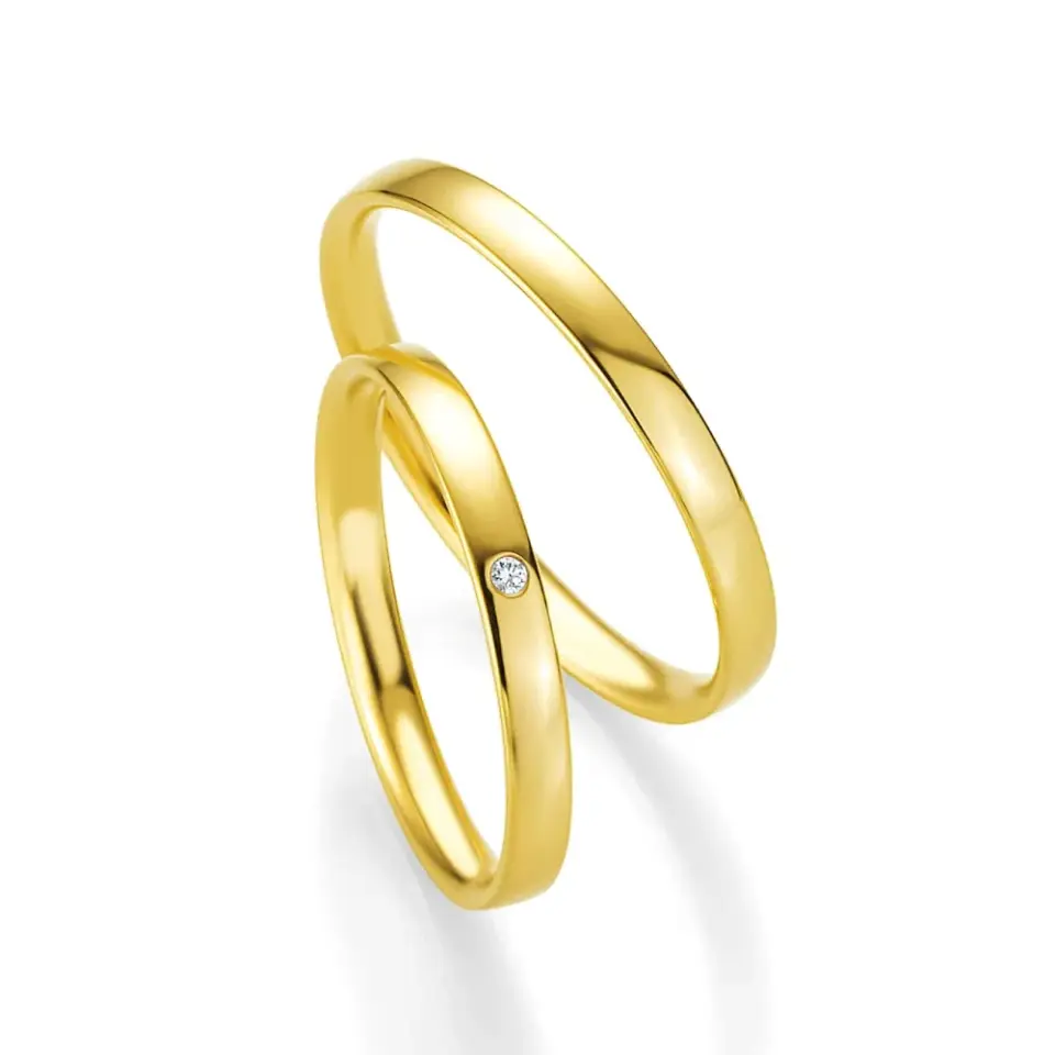 Alianzas de boda de oro amarillo con diamante