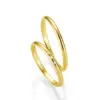 Alianzas de boda de oro amarillo con diamantes