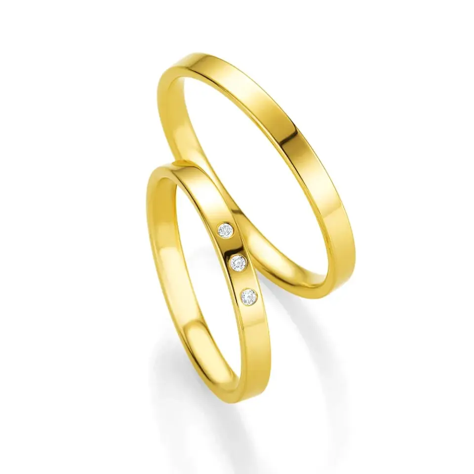 Alianzas de boda de oro amarillo con diamantes