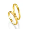 Alianzas de boda de oro amarillo con diamantes