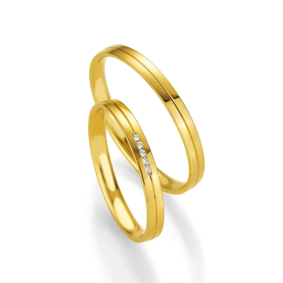 Alianzas de boda de oro amarillo con diamantes
