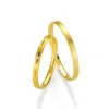 Alianzas de boda de oro amarillo con diamante