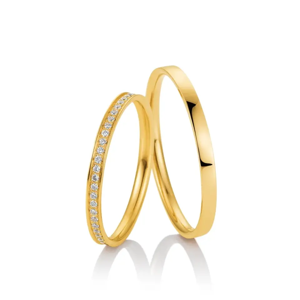 Alianzas de boda de oro amarillo con diamantes