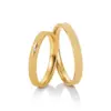 Alianzas de boda de oro amarillo con diamante