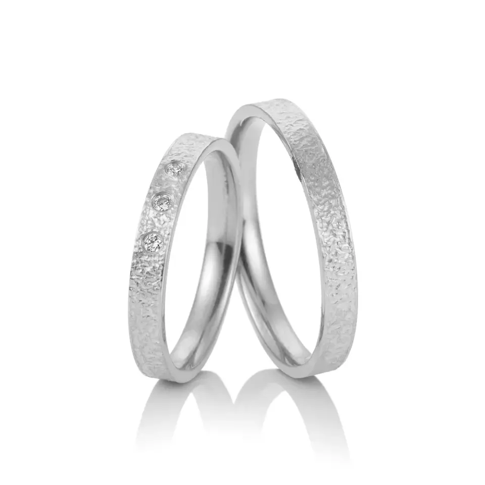 Alianzas de boda de oro blanco con diamantes