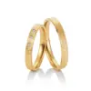Alianzas de boda de oro amarillo con diamantes