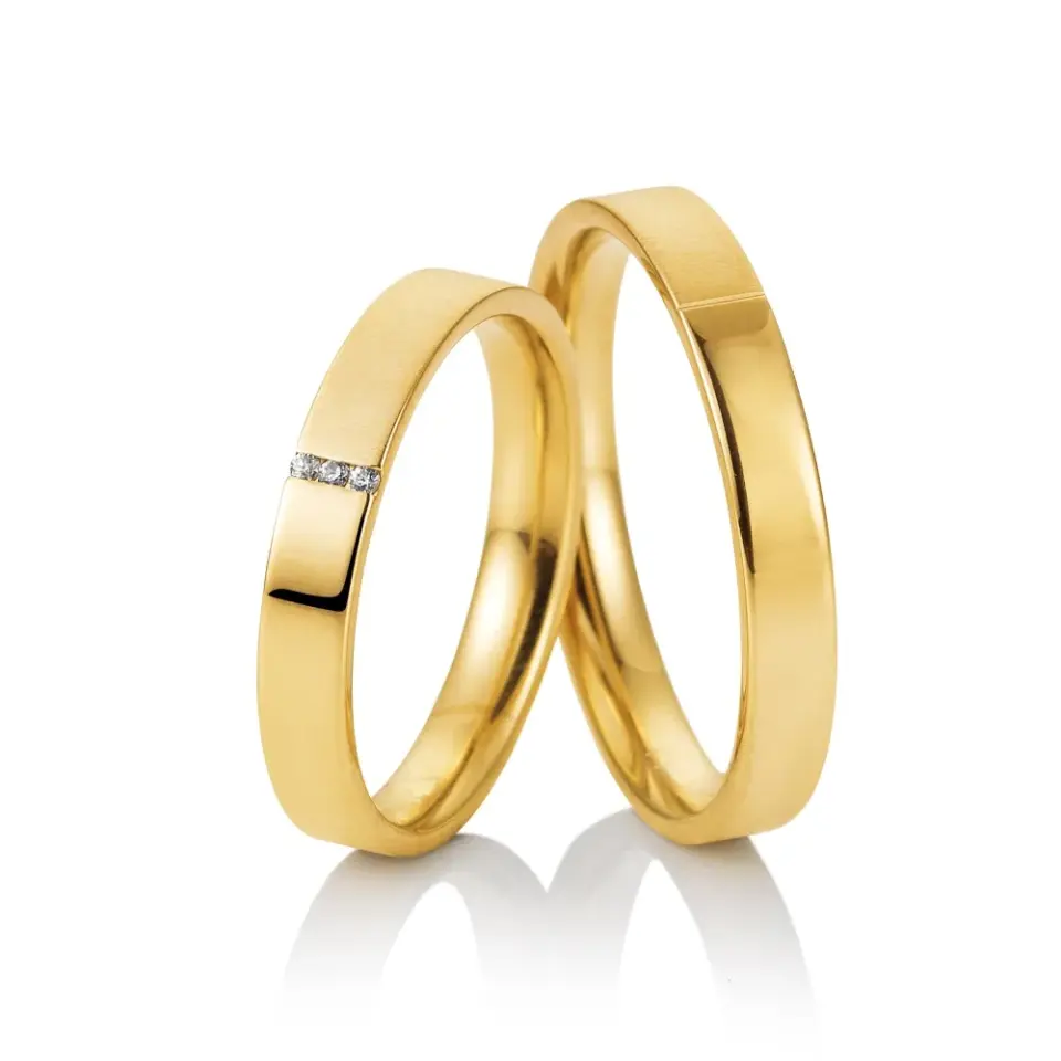 Alianzas de boda de oro amarillo con diamantes