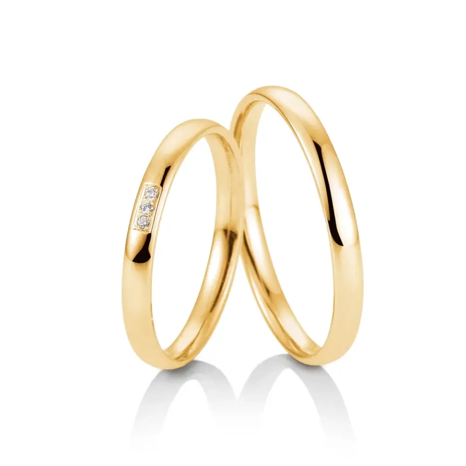 Alianzas de boda de oro amarillo con diamantes