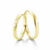 Alianzas de boda de oro amarillo con diamantes