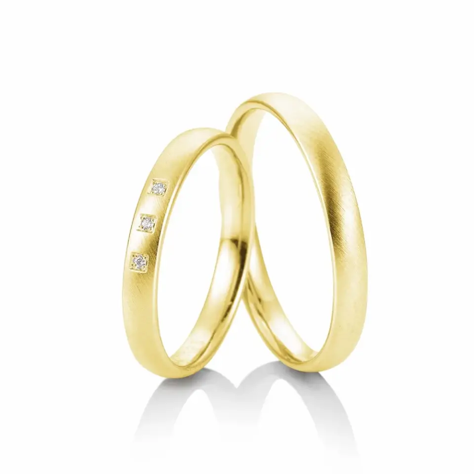 Alianzas de boda de oro amarillo con diamantes