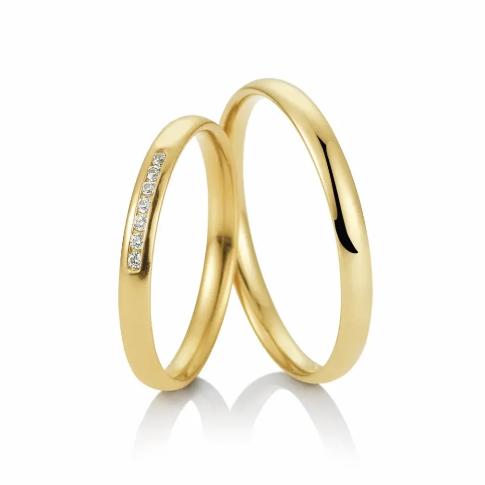 Alianzas de boda de oro amarillo con diamantes