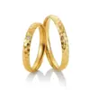 Alianzas de boda de oro amarillo con diamante