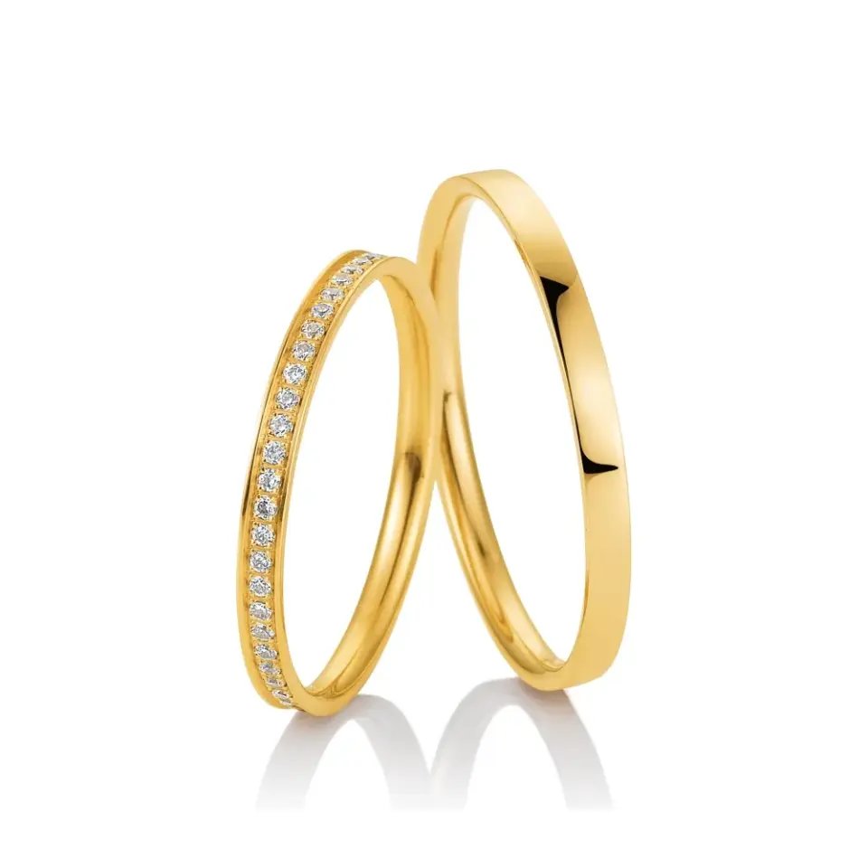 Alianzas de boda de oro amarillo con diamantes