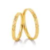Alianzas de boda de oro amarillo con diamante