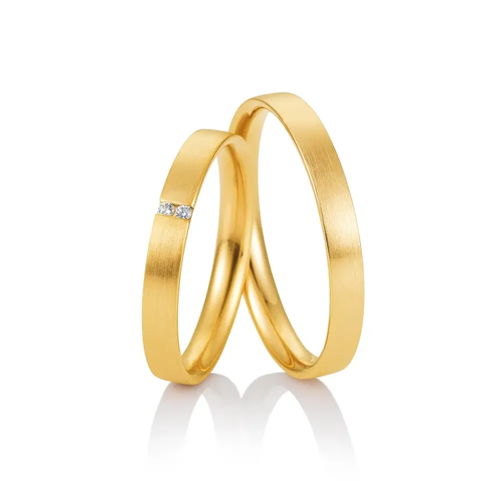 Alianzas de boda de oro amarillo con diamantes