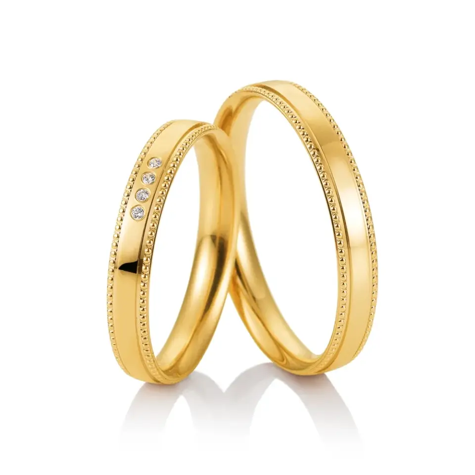 Alianzas de boda de oro amarillo con diamantes