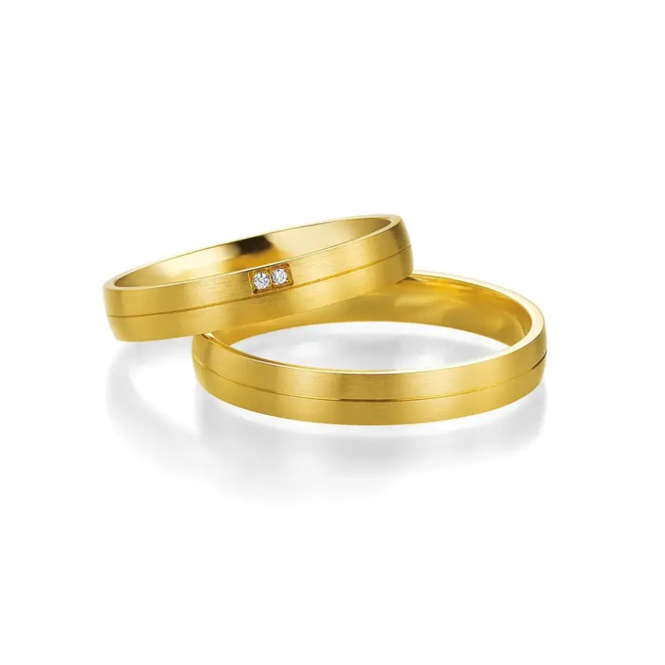 Alianzas de boda de oro amarillo con diamantes