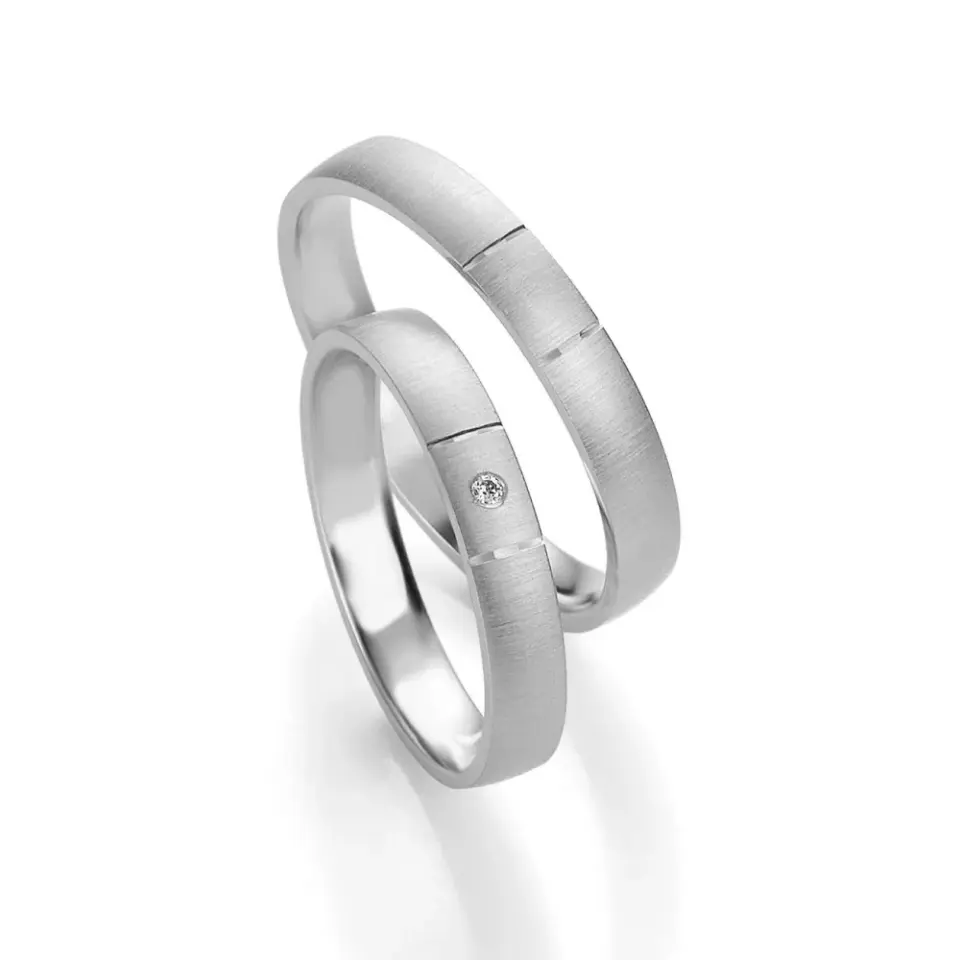 Alianzas de boda de platino con diamante