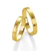 Alianzas de boda de oro amarillo con diamante