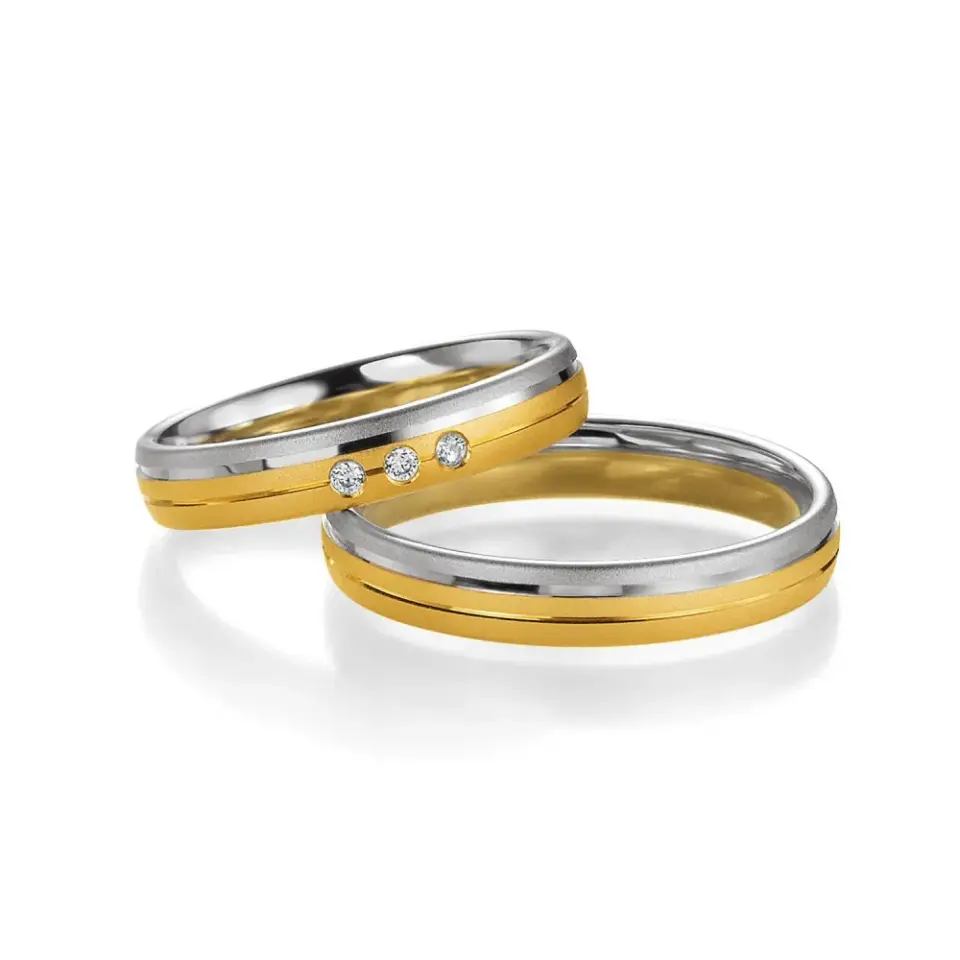 Alianzas de boda de oro amarillo y paladio con diamantes