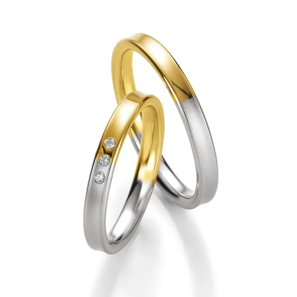 Alianzas de boda de oro amarillo y paladio con diamantes