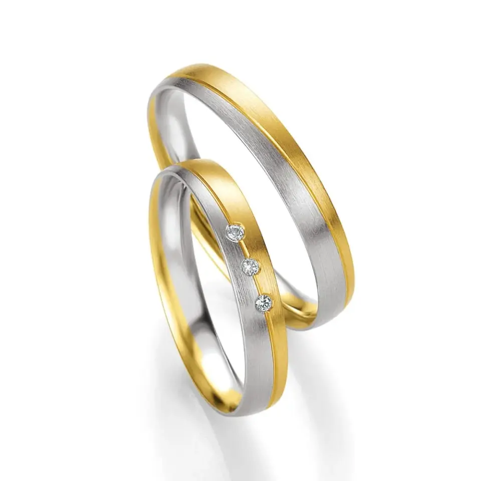 Alianzas de boda de oro amarillo y paladio con diamantes