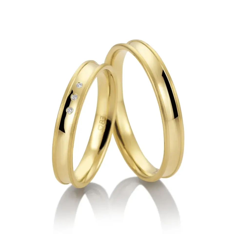 Alianzas de boda de oro amarillo con diamantes